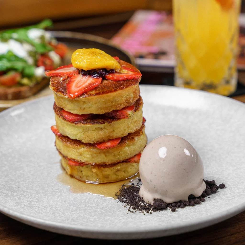Enjoy breakfast by the sea at Ku De Ta! Try our Protein Pancakes!